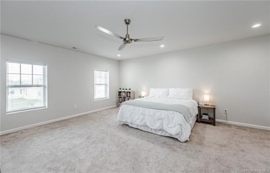 As you step inside, notice the LVP flooring  recessed lighting on Colonial Heritage Golf Club in Virginia - for sale on GolfHomes.com, golf home, golf lot