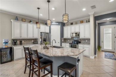 Discover the exceptional Ibis Model home, a wonderful layout on on Gateway Golf and Country Club in Florida - for sale on GolfHomes.com, golf home, golf lot