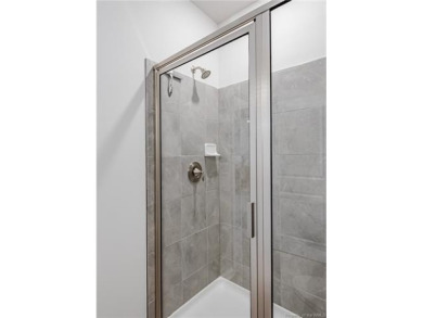 As you step inside, notice the LVP flooring  recessed lighting on Colonial Heritage Golf Club in Virginia - for sale on GolfHomes.com, golf home, golf lot