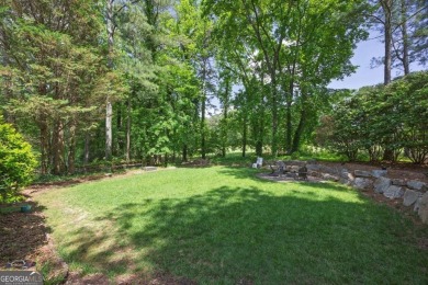Perfectly positioned on the fairway of the par-5 2nd hole in the on Towne Lake Hills Golf Club in Georgia - for sale on GolfHomes.com, golf home, golf lot