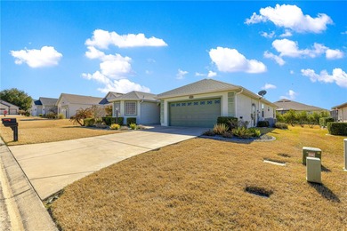 One or more photos have been virtually staged.  Stonecrest is a on Stonecrest Golf and Club Club in Florida - for sale on GolfHomes.com, golf home, golf lot