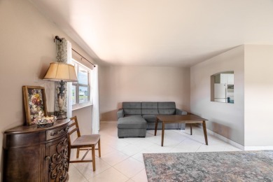 BEAUTIFULLY UPDATED 1/1.1 TOP CORNER UNIT WITH WATER VIEWS FROM on Addison Reserve in Florida - for sale on GolfHomes.com, golf home, golf lot