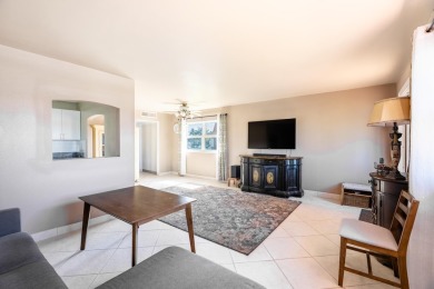 BEAUTIFULLY UPDATED 1/1.1 TOP CORNER UNIT WITH WATER VIEWS FROM on Addison Reserve in Florida - for sale on GolfHomes.com, golf home, golf lot