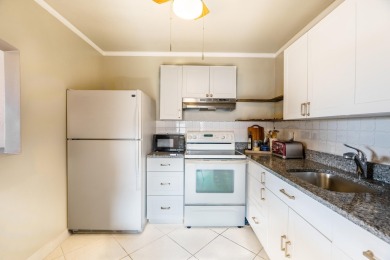 BEAUTIFULLY UPDATED 1/1.1 TOP CORNER UNIT WITH WATER VIEWS FROM on Addison Reserve in Florida - for sale on GolfHomes.com, golf home, golf lot