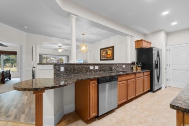 Experience luxury and tranquility in this fully furnished on Barefoot Resort and Golf Club  in South Carolina - for sale on GolfHomes.com, golf home, golf lot