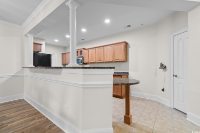 Experience luxury and tranquility in this fully furnished on Barefoot Resort and Golf Club  in South Carolina - for sale on GolfHomes.com, golf home, golf lot
