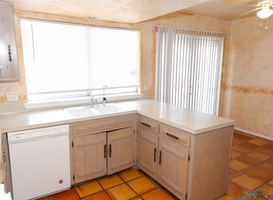 Nice patio home located on the golf course in Colonial Park on Chaparral Country Club in New Mexico - for sale on GolfHomes.com, golf home, golf lot