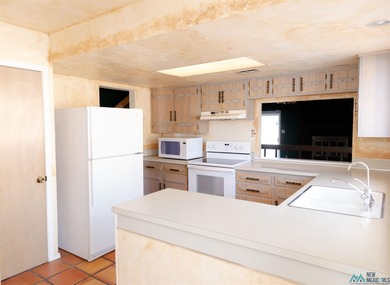 Nice patio home located on the golf course in Colonial Park on Chaparral Country Club in New Mexico - for sale on GolfHomes.com, golf home, golf lot