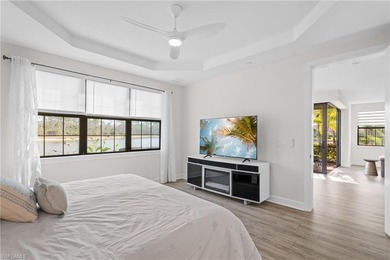 STUNNING 2-BEDROOM + DEN COACH HOME WITH BREATHTAKING WATER & on Esplanade Golf and  Country Club in Florida - for sale on GolfHomes.com, golf home, golf lot