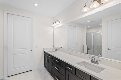 STUNNING 2-BEDROOM + DEN COACH HOME WITH BREATHTAKING WATER & on Esplanade Golf and  Country Club in Florida - for sale on GolfHomes.com, golf home, golf lot