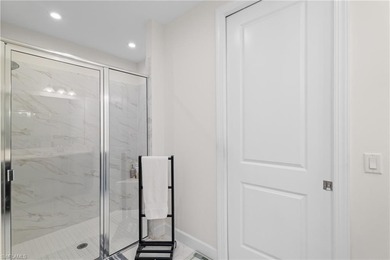 STUNNING 2-BEDROOM + DEN COACH HOME WITH BREATHTAKING WATER & on Esplanade Golf and  Country Club in Florida - for sale on GolfHomes.com, golf home, golf lot