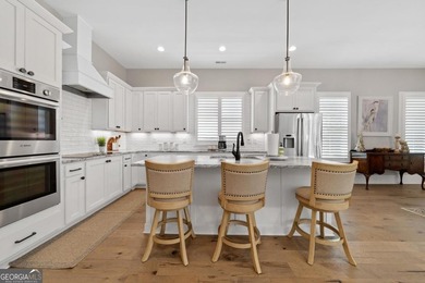 Nestled in the prestigious Harbor Club community on Lake Oconee on Harbor Club Golf and Country Club in Georgia - for sale on GolfHomes.com, golf home, golf lot