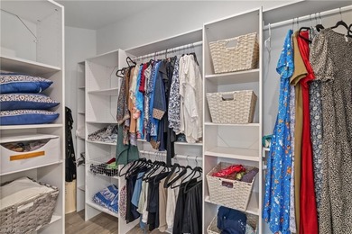 STUNNING 2-BEDROOM + DEN COACH HOME WITH BREATHTAKING WATER & on Esplanade Golf and  Country Club in Florida - for sale on GolfHomes.com, golf home, golf lot