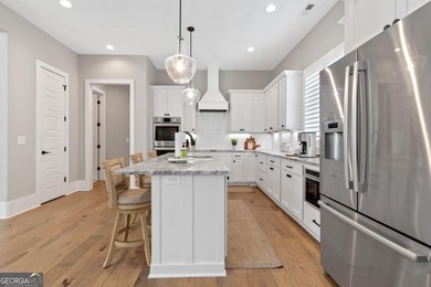 Nestled in the prestigious Harbor Club community on Lake Oconee on Harbor Club Golf and Country Club in Georgia - for sale on GolfHomes.com, golf home, golf lot