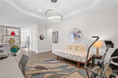 STUNNING 2-BEDROOM + DEN COACH HOME WITH BREATHTAKING WATER & on Esplanade Golf and  Country Club in Florida - for sale on GolfHomes.com, golf home, golf lot