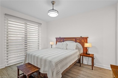 STUNNING 2-BEDROOM + DEN COACH HOME WITH BREATHTAKING WATER & on Esplanade Golf and  Country Club in Florida - for sale on GolfHomes.com, golf home, golf lot