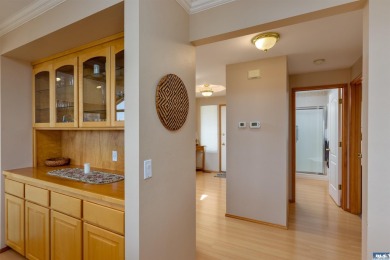 This beautifully maintained 3-bedroom, 3-bathroom residence on Peninsula Golf Club Inc. in Washington - for sale on GolfHomes.com, golf home, golf lot