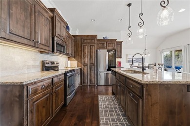 Beautiful maintenance free home has done all of the heavy on Fred Arbanas Golf Course At Longview Lakes - Longview Lake in Missouri - for sale on GolfHomes.com, golf home, golf lot