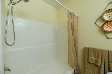This beautifully maintained 3-bedroom, 3-bathroom residence on Peninsula Golf Club Inc. in Washington - for sale on GolfHomes.com, golf home, golf lot
