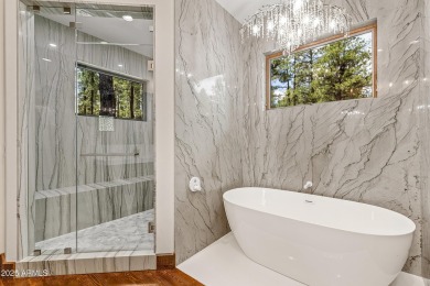 WOW! This stunning rustic modern retreat in the pines is move-in on Forest Highlands Golf Club - The Canyon in Arizona - for sale on GolfHomes.com, golf home, golf lot
