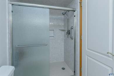 This beautifully maintained 3-bedroom, 3-bathroom residence on Peninsula Golf Club Inc. in Washington - for sale on GolfHomes.com, golf home, golf lot