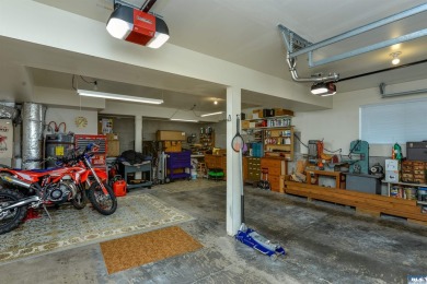 This beautifully maintained 3-bedroom, 3-bathroom residence on Peninsula Golf Club Inc. in Washington - for sale on GolfHomes.com, golf home, golf lot
