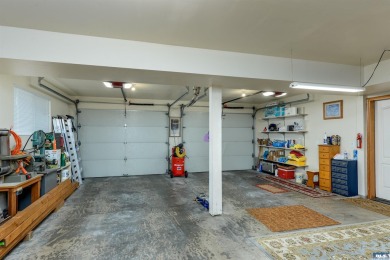 This beautifully maintained 3-bedroom, 3-bathroom residence on Peninsula Golf Club Inc. in Washington - for sale on GolfHomes.com, golf home, golf lot