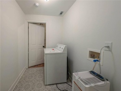 This impressive 7-bedroom, 5-bathroom residence offers nearly 4 on Polo Golf and Country Club in Georgia - for sale on GolfHomes.com, golf home, golf lot