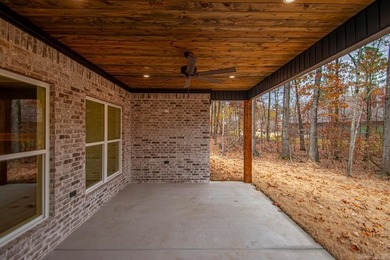 Step inside this beautiful new 4 bed, 2.5 bath home and fall in on Silver Springs Country Club in Arkansas - for sale on GolfHomes.com, golf home, golf lot