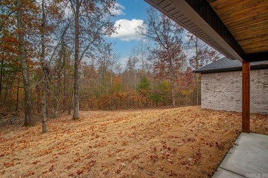 Step inside this beautiful new 4 bed, 2.5 bath home and fall in on Silver Springs Country Club in Arkansas - for sale on GolfHomes.com, golf home, golf lot