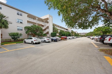 Welcome to your perfect Florida retreat! This beautifully on Wynmoor Golf Course in Florida - for sale on GolfHomes.com, golf home, golf lot