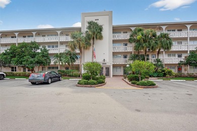 Welcome to your perfect Florida retreat! This beautifully on Wynmoor Golf Course in Florida - for sale on GolfHomes.com, golf home, golf lot