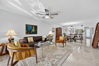 Welcome to your perfect Florida retreat! This beautifully on Wynmoor Golf Course in Florida - for sale on GolfHomes.com, golf home, golf lot