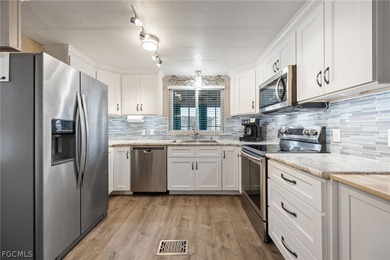 Welcome to your dream home in the prestigious Six Lakes Country on Six Lakes Country Club in Florida - for sale on GolfHomes.com, golf home, golf lot