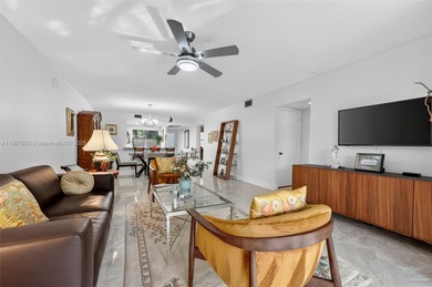 Welcome to your perfect Florida retreat! This beautifully on Wynmoor Golf Course in Florida - for sale on GolfHomes.com, golf home, golf lot