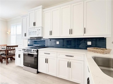 END UNIT CONDO in NAPLES HERITAGE Golf and Country Club - Full on Naples Heritage Golf and Country Club in Florida - for sale on GolfHomes.com, golf home, golf lot