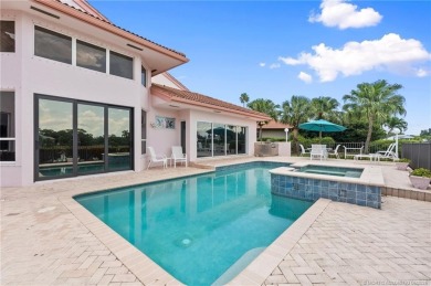 Enjoy natural light and serene views overlooking the lake, pool on Pipers Landing Country Club in Florida - for sale on GolfHomes.com, golf home, golf lot
