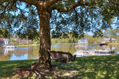 Welcome to this stunning 3-bedroom, 2.5-bathroom waterfront home on Players Course At Wyboo Plantation in South Carolina - for sale on GolfHomes.com, golf home, golf lot