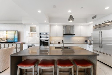 FULLY FURNISHED designer residence at Water Club with on Lost Tree Club in Florida - for sale on GolfHomes.com, golf home, golf lot