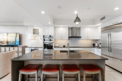 FULLY FURNISHED designer residence at Water Club with on Lost Tree Club in Florida - for sale on GolfHomes.com, golf home, golf lot