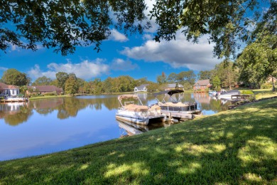Welcome to this stunning 3-bedroom, 2.5-bathroom waterfront home on Players Course At Wyboo Plantation in South Carolina - for sale on GolfHomes.com, golf home, golf lot