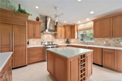 Enjoy natural light and serene views overlooking the lake, pool on Pipers Landing Country Club in Florida - for sale on GolfHomes.com, golf home, golf lot