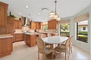 Enjoy natural light and serene views overlooking the lake, pool on Pipers Landing Country Club in Florida - for sale on GolfHomes.com, golf home, golf lot