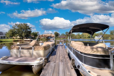 Welcome to this stunning 3-bedroom, 2.5-bathroom waterfront home on Players Course At Wyboo Plantation in South Carolina - for sale on GolfHomes.com, golf home, golf lot