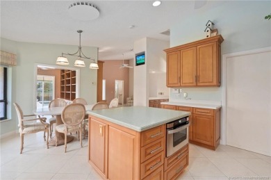Enjoy natural light and serene views overlooking the lake, pool on Pipers Landing Country Club in Florida - for sale on GolfHomes.com, golf home, golf lot
