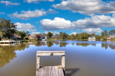 Welcome to this stunning 3-bedroom, 2.5-bathroom waterfront home on Players Course At Wyboo Plantation in South Carolina - for sale on GolfHomes.com, golf home, golf lot