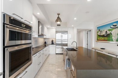 FULLY FURNISHED designer residence at Water Club with on Lost Tree Club in Florida - for sale on GolfHomes.com, golf home, golf lot