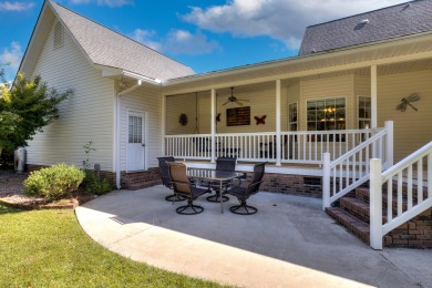 Welcome to this stunning 3-bedroom, 2.5-bathroom waterfront home on Players Course At Wyboo Plantation in South Carolina - for sale on GolfHomes.com, golf home, golf lot