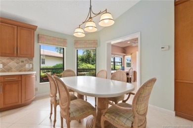 Enjoy natural light and serene views overlooking the lake, pool on Pipers Landing Country Club in Florida - for sale on GolfHomes.com, golf home, golf lot