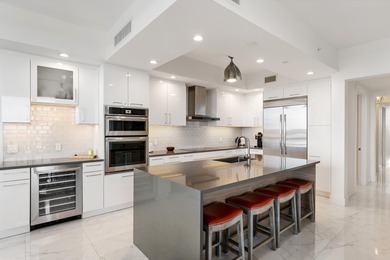 FULLY FURNISHED designer residence at Water Club with on Lost Tree Club in Florida - for sale on GolfHomes.com, golf home, golf lot